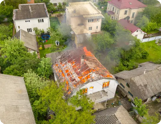 Fire Scene Reconstruction – A digitally reconstructed 3D model of a fire-damaged home displayed on a large screen in an analysis room, with experts pointing at fire progression zones.